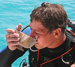Blue Water Ventures diver Michael DeMar sips champagne from the chalice. It is believed to come from the 1622 Spanish galleon Santa Margarita. Blue Water is searching for the remains of the Margarita under a joint-venture partnership with Mel Fisher's Treasures. 