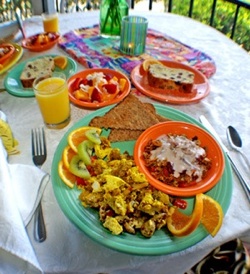 At breakfast, guests at the small Caribbean-style inn can savor vegetarian feasts of home-baked breads and fruits, organic and sourced locally, and the kitchen serves only organic fair trade coffee and tea.