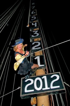 Evalena Worthington practices her descent from a tall ship's mast at the Schooner Wharf Bar, in advance of this year's celebration. 