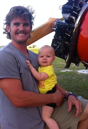 Daughter Peyton, at nine months, is already learning about her father's passion of airplanes. 