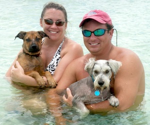 Away from work, Nadene relaxes with her husband and adopted dogs for a day on the water. 