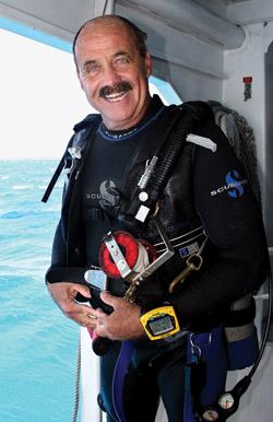 Captain Slate has become a legend in the Florida Keys and a well-known celebrity in both diving and non-diving circles; he has been cultivating marine relationships for 30 years. (Photo by Frazier Nevins)